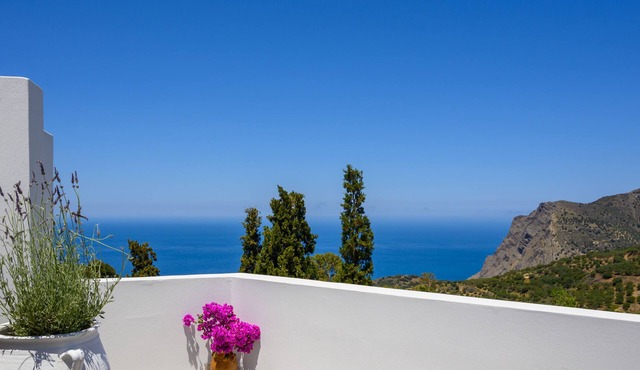 A cozy house with a beautiful view of mountain & sea.