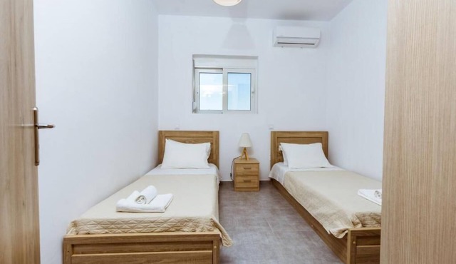 Beach front,quiet big apartment in western Crete pool + hot tub , bbq