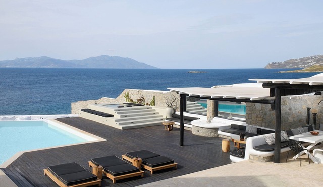 Luxurious Sunset Sea Front 5 Master bedroom villa with exterior hot tub.