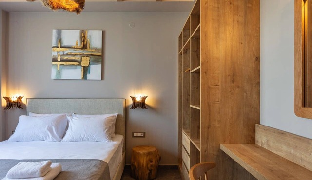 Modern Luxury 2-Bed Apt, in the heart of Stalis and steps from the Beach.