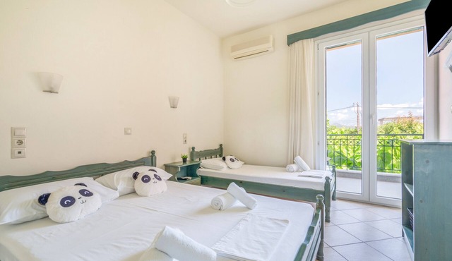 Odysseia Apartment 4 - 2 Min Walk to Beach, 3 Adults, Terrace, Wi-Fi & AC