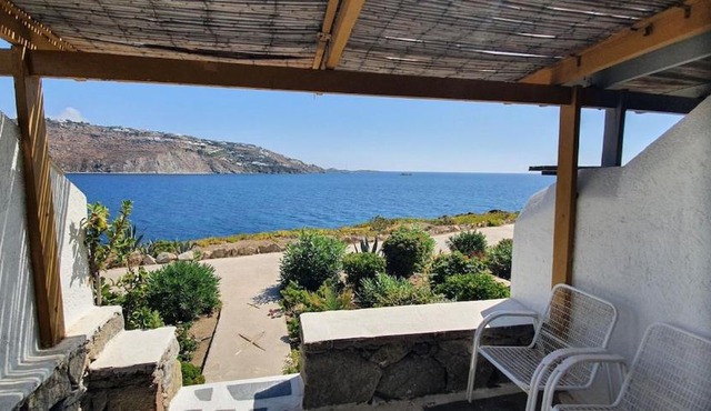 Panoramic View of Ornos Bay in Mykonos & Pool by ΜΡS in Mikonos