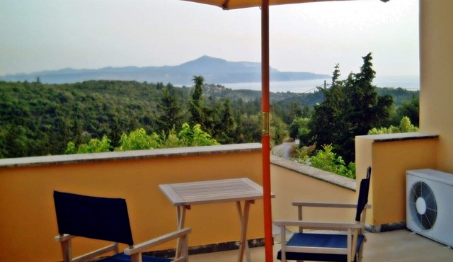 Small village house, shared pool and views of the countryside and sea