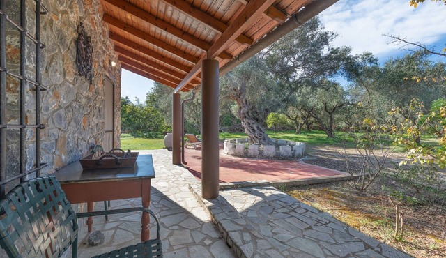 Stone house among trees with private garden, terrace & Wi-Fi