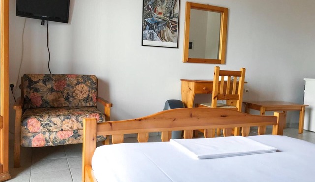 Studio Apartment 'Hotel Antigoni Triple Room 14' with Lake View, Wi-Fi and Air Conditioning