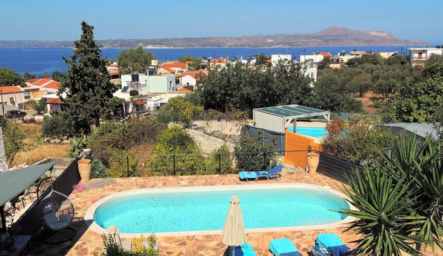 Stylish 3 bedroom villa, private pool, sea views, walk to tavernas and beach.