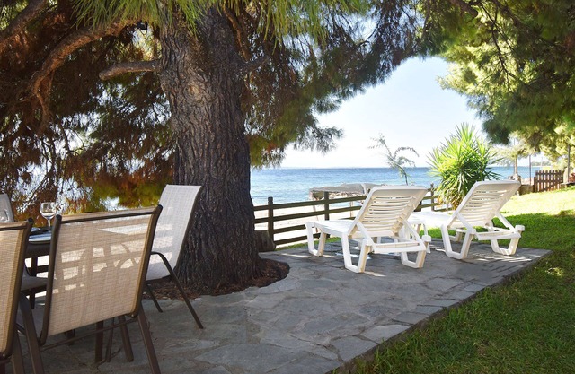 A groundfloor beachfront apartment at Metamorfosi Sithonia for 5 guests in Metamorfosi