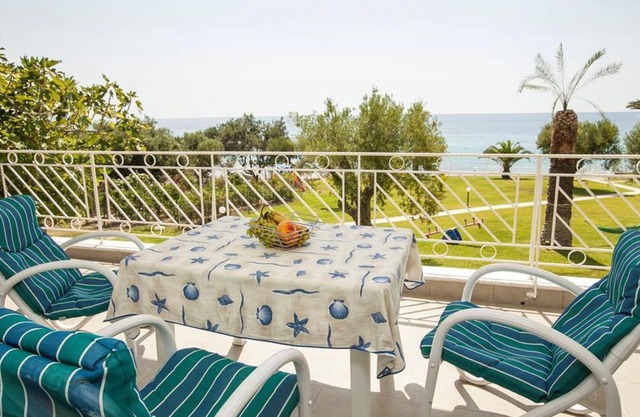 Luxurious villa with great yard, just where the sea meets the beach in Mola Kaliva