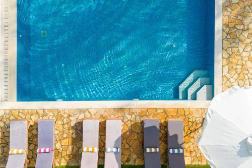 Velonades Villa | 142 m² Villa ∙ 5 bedrooms ∙ 14 guests