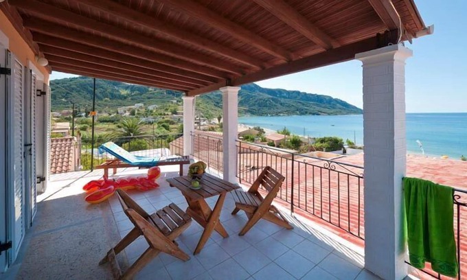 Agios Georgios Pagon Apartment | Arista Apartment 2 - with sea view right on the beach of Agios Georgios Pagon