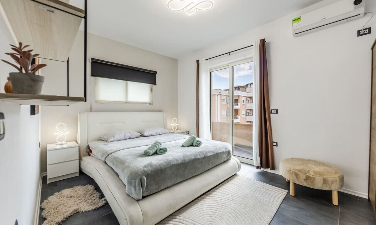Shkoder Apartment | Modern 1BR with Scenic Views & Earthy Vibes by PikHost