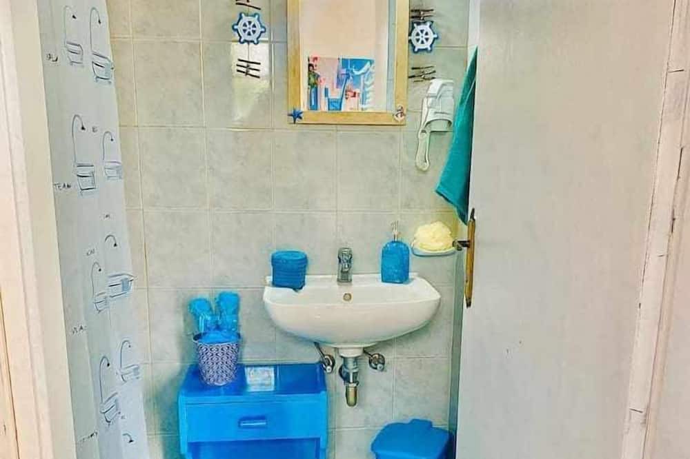 Photo of Bathroom in Magoulades