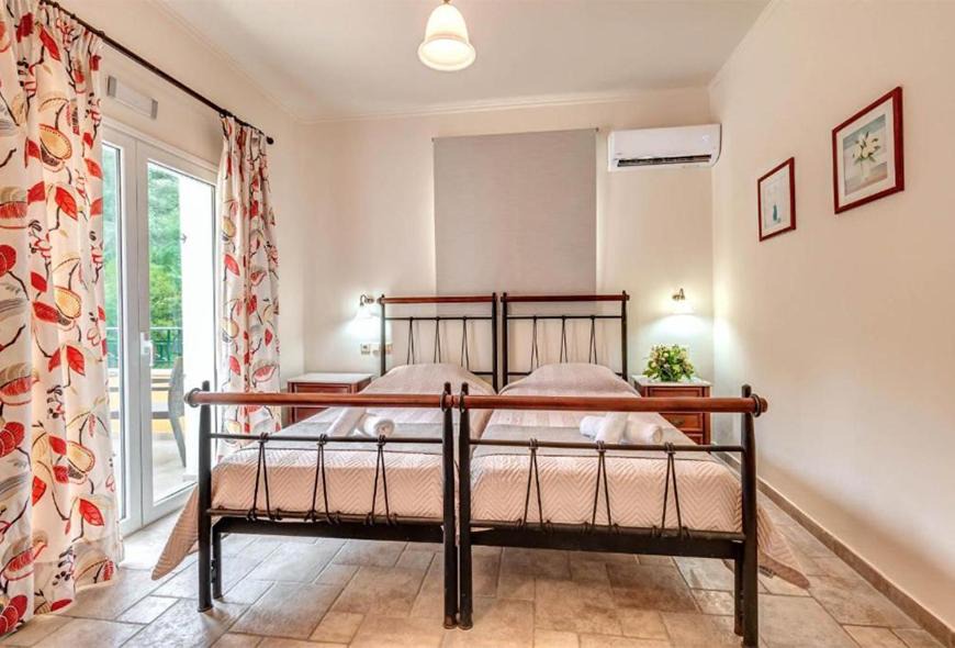 Photo of Bedroom in Agios Stefanos Avliotes