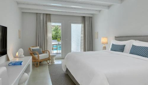 Junior King Suite with Sharing Pool and Poolside View