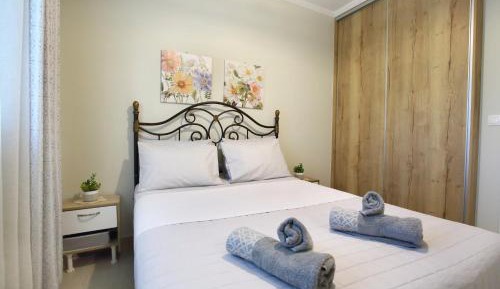 One-Bedroom Apartment with Balcony and City View