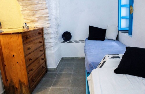 Ioulida House | Build-on-rock "Oleanders" a traditional house built on the rocky slope of Kea