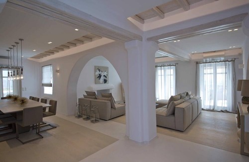 Tourlos Villa | My Rental Homes - Villa Opallia with spacious living and dining areas and a pool