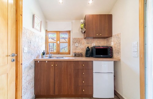 Chalikounas House | Holiday Home 'Wooden House Corfu' with Pool, Garden, Terrace & Wi-Fi