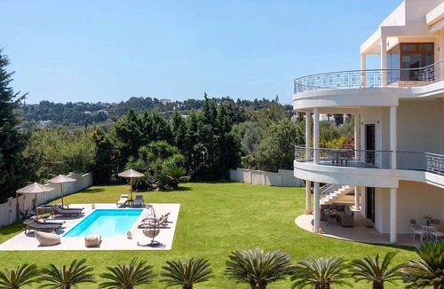 Asgourou Villa | Elegant Rhodes Villa | Villa Themis | 5 Bedrooms | Private Pool | Furnished Terrace | Modern Design and Stylish Amenities | Parking Area | Koskinou