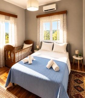 Pamvotida House | Cozy Retreat with Fireplace & BBQ
