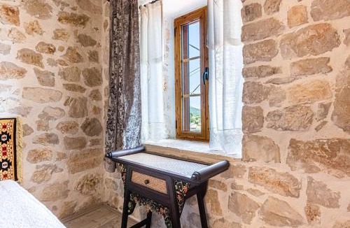 Vuno Apartment | Mosaic of Vuno 2 Stories in Stone, Views & Love